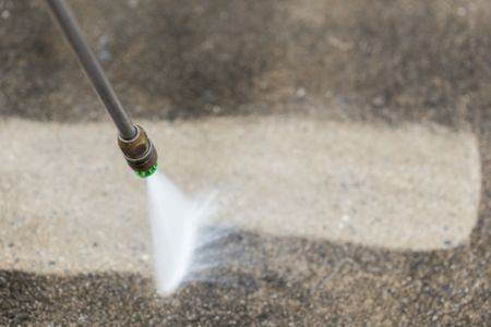 Concrete Washing 101: What Actually Removes Black Spots and Algae?